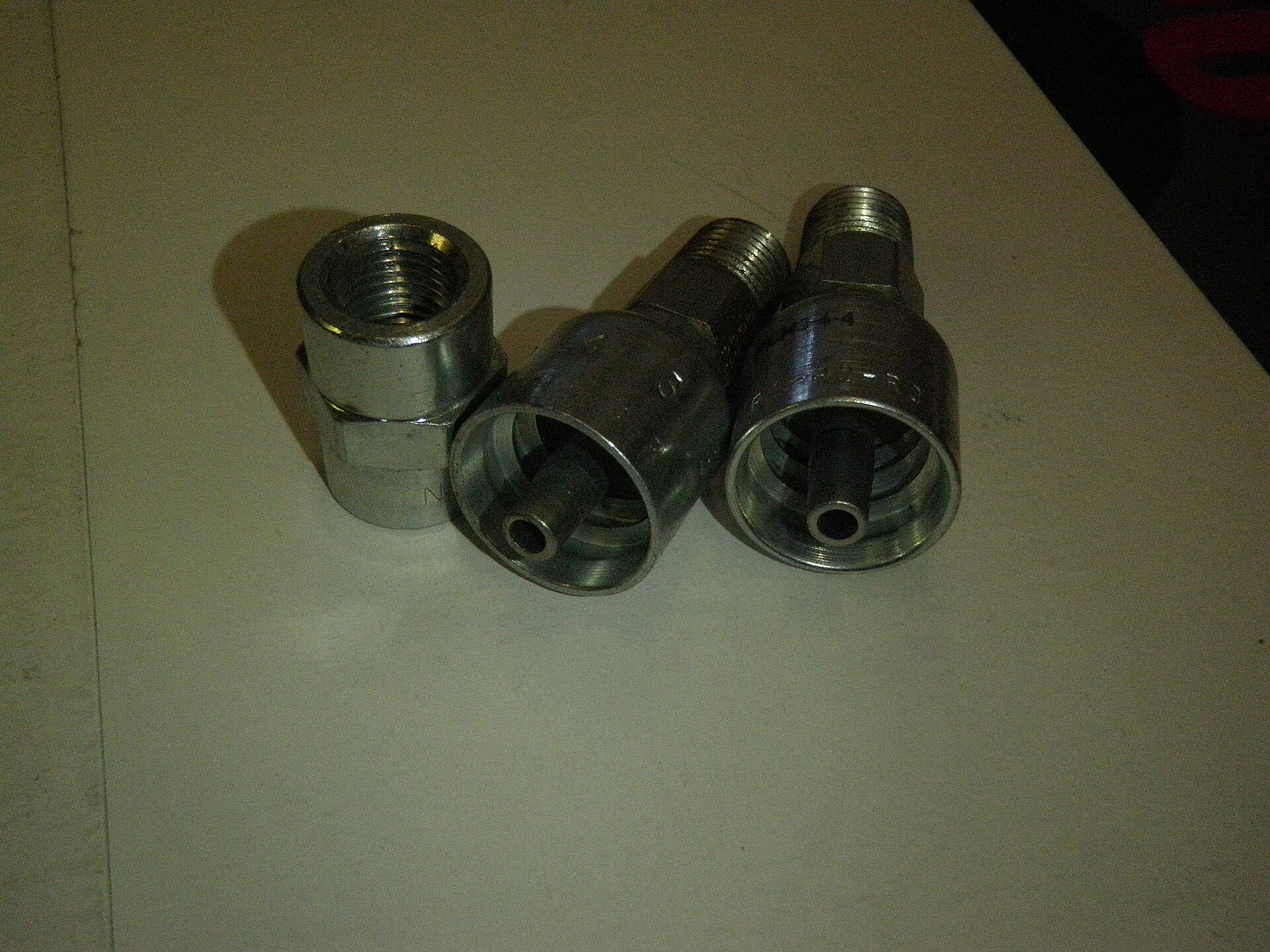 Hydraulic hose fittings and repair parts